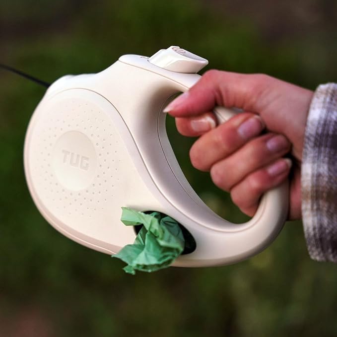 TUG Oval 360° Tangle-Free Retractable Dog Leash with Integrated Waste Bag Dispenser (Small, Cream)