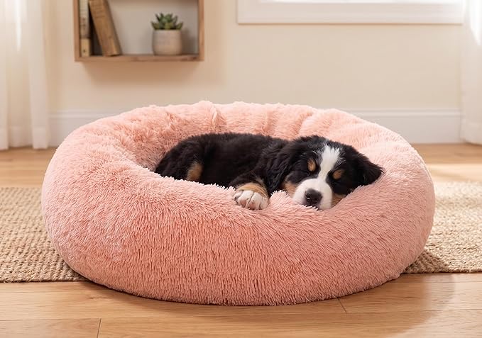 SAVFOX 23 inches Calming Donut Dog Bed - 3X Durable Plush Faux Fur, Machine Washable & Non-Slip, Fits up to 25 lbs, Pink